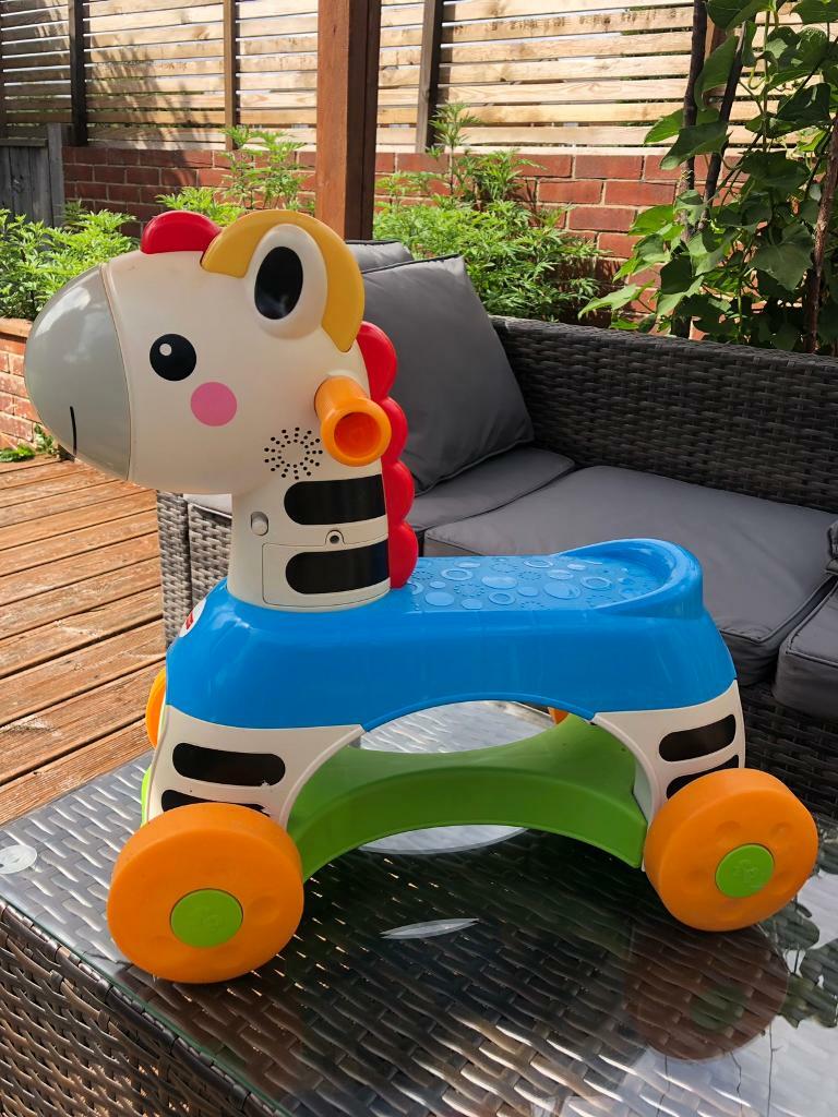 zebra ride on toy fisher price